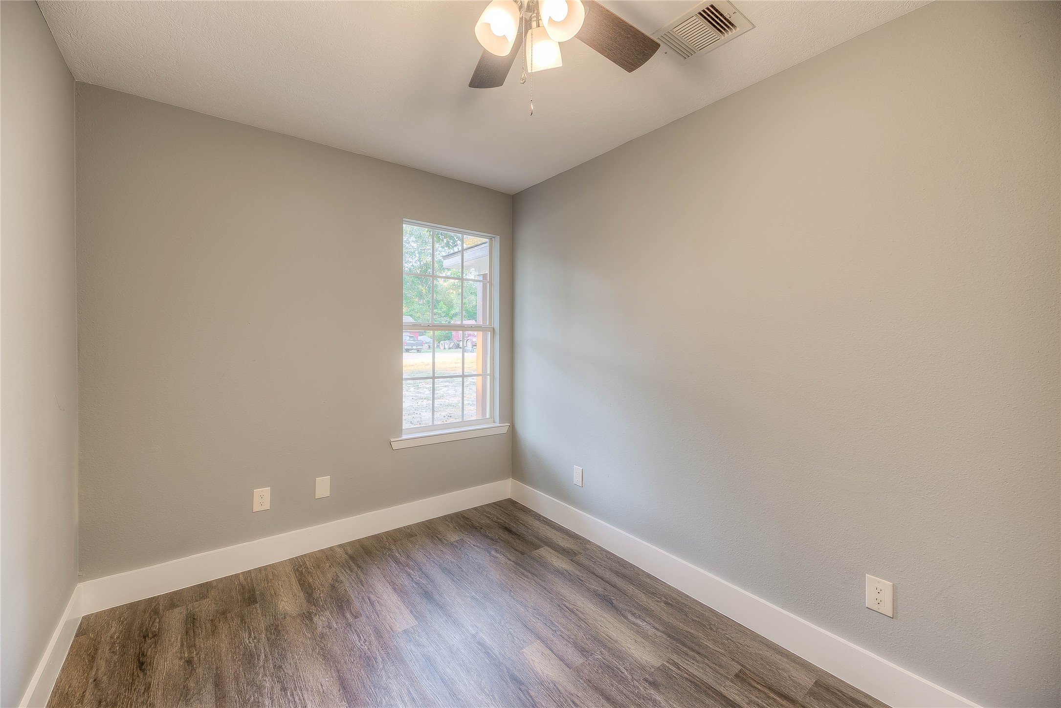 388 Sunrise Wood Road Goodrich, TX 77335 - Photo 11 of 33 an empty room with a window