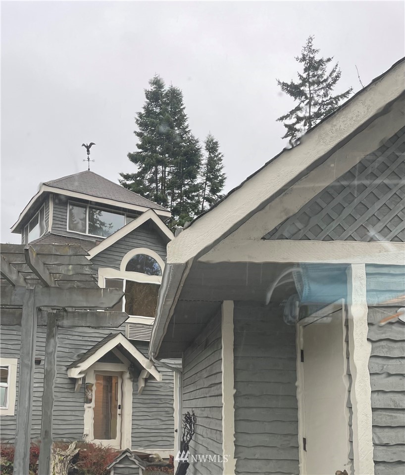 2039 West Sequim Bay Road Sequim, WA 98382 - Photo 1 of 1 a front view of a house with a yard