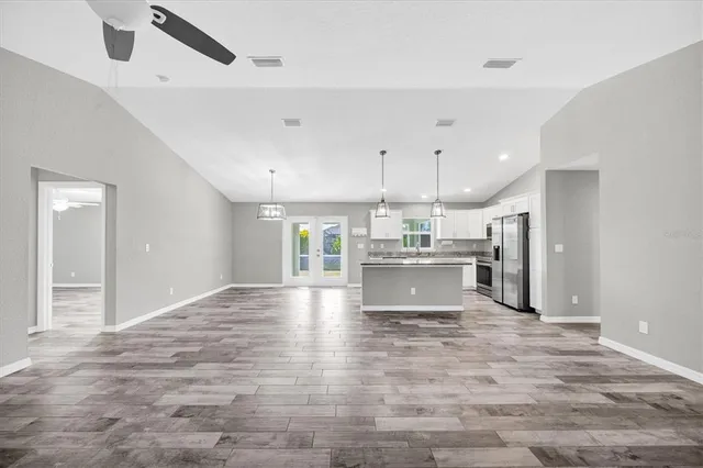 a view of kitchen with wooden floor