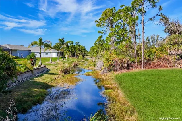 a view of a houses with yard