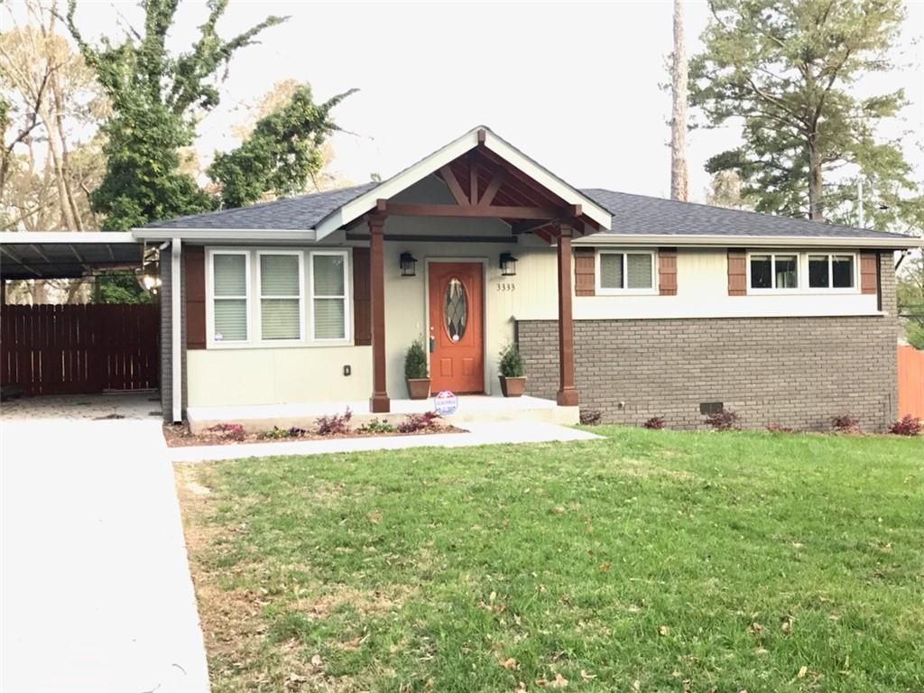 3333 Renault Road Southeast Atlanta, GA 30354 - Photo 1 of 1 Front of Beautiful grey home with copper and brown accents.