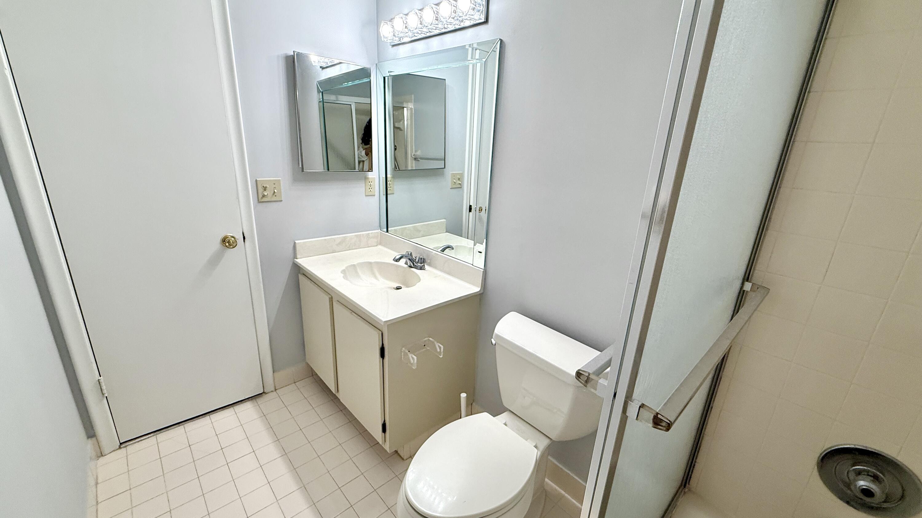 5242 Privet Place Delray Beach, FL 33484 - Photo 30 of 50 a utility room with sink dryer and washer