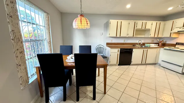 a bedroom with a bed and a mirror