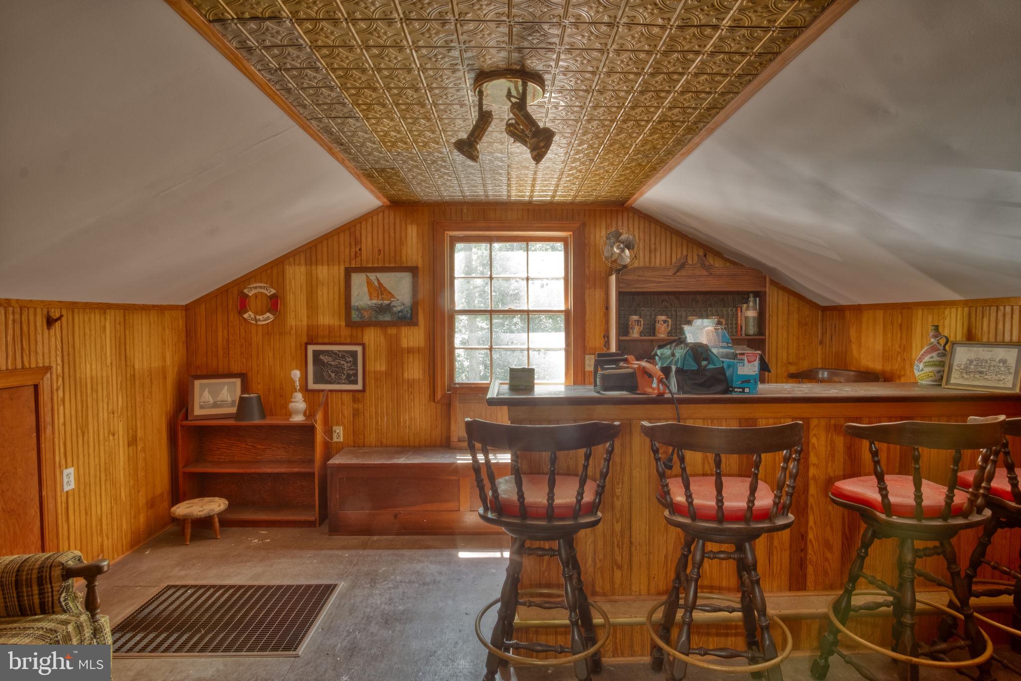 1067 Level Green Road Lancaster, VA 22503 - Photo 57 of 80 Garage Upper Level Bar/Man Cave