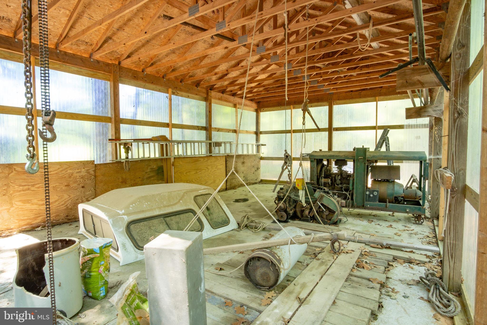 1067 Level Green Road Lancaster, VA 22503 - Photo 66 of 80 Pavilion has Oil Changing Pit