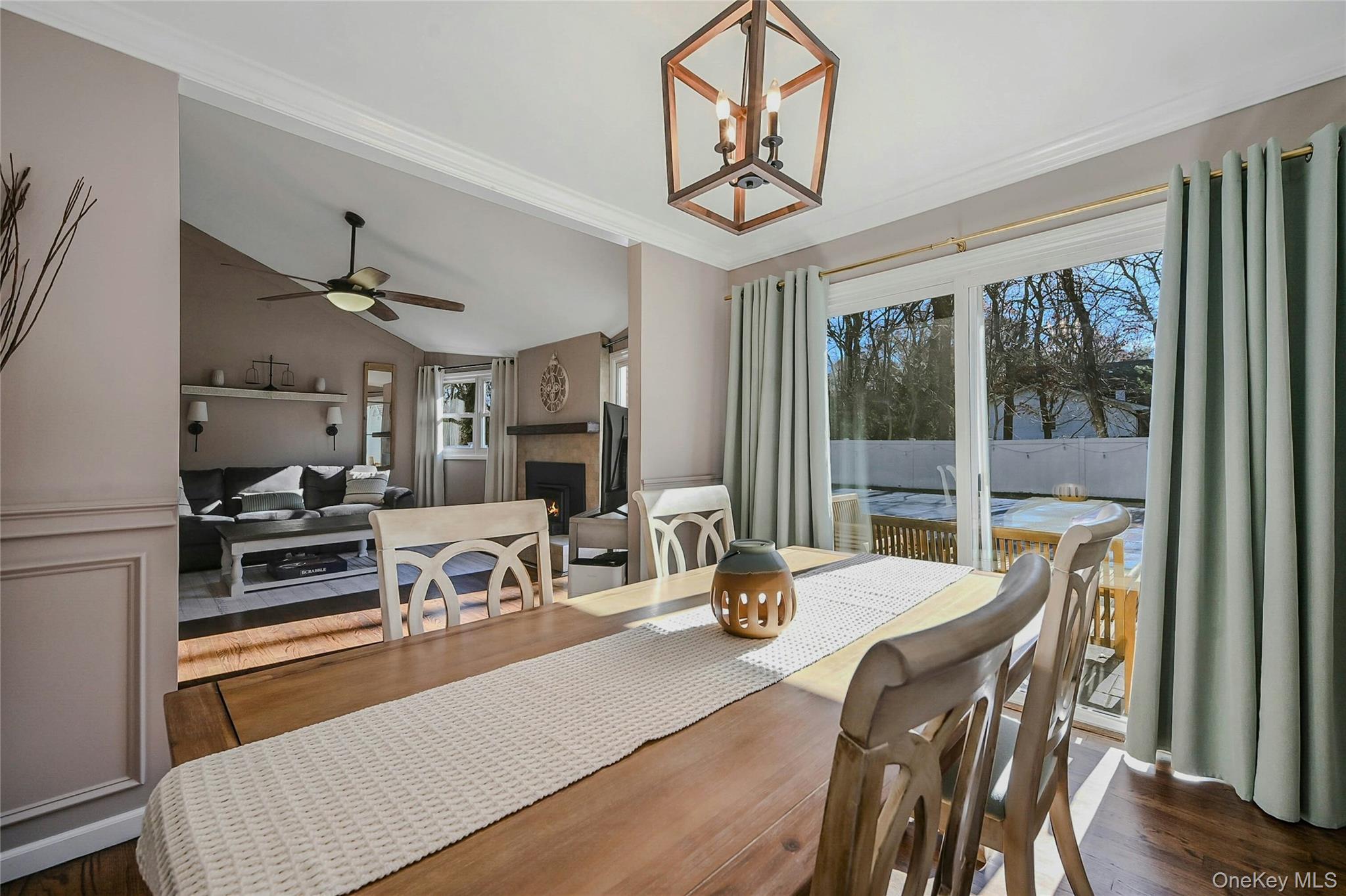 4 Park Road Rocky Point, NY 11778 - Photo 18 of 38 a view of a dining room with furniture large window and wooden floor
