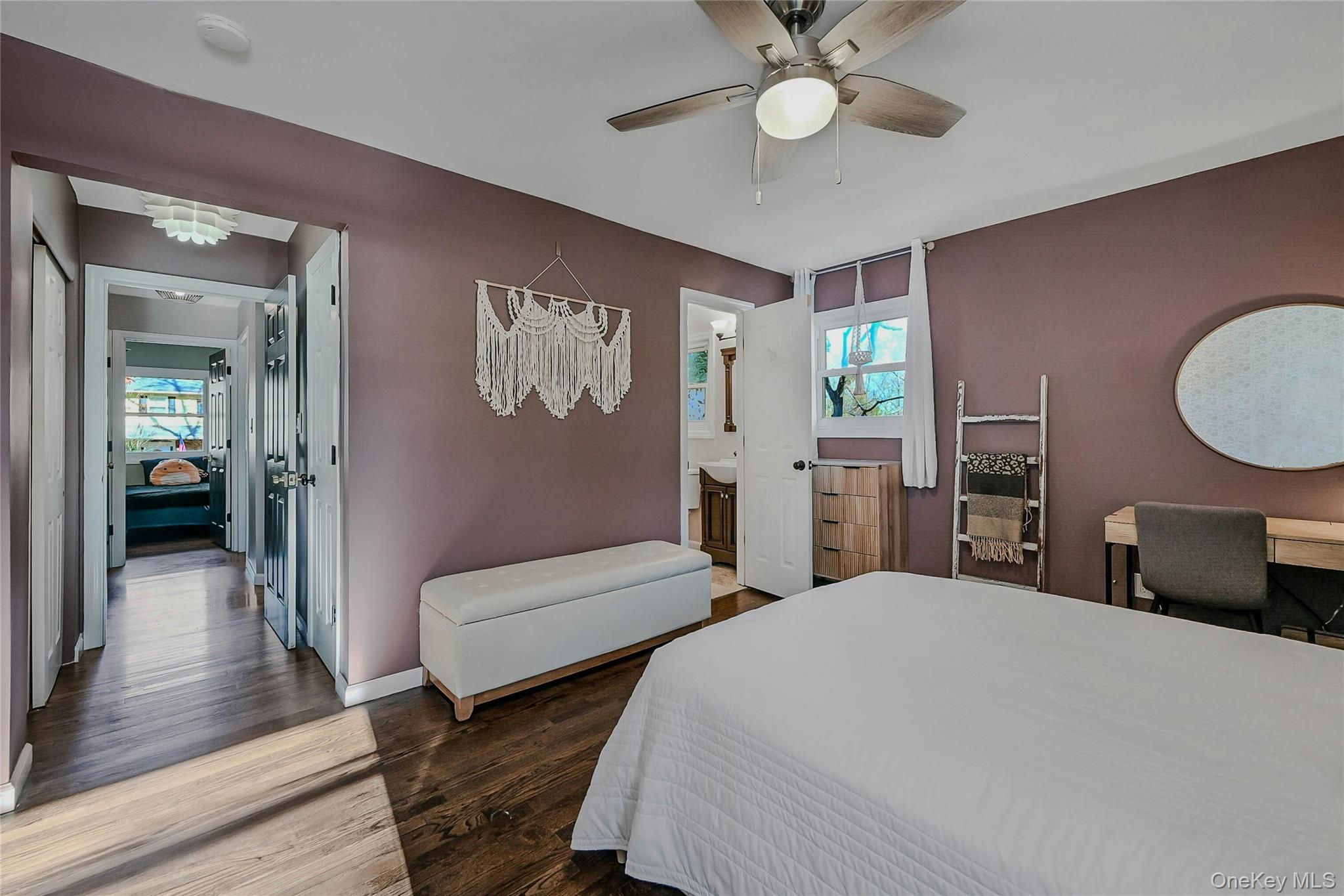 4 Park Road Rocky Point, NY 11778 - Photo 21 of 38 a bedroom with a bed and a chandelier