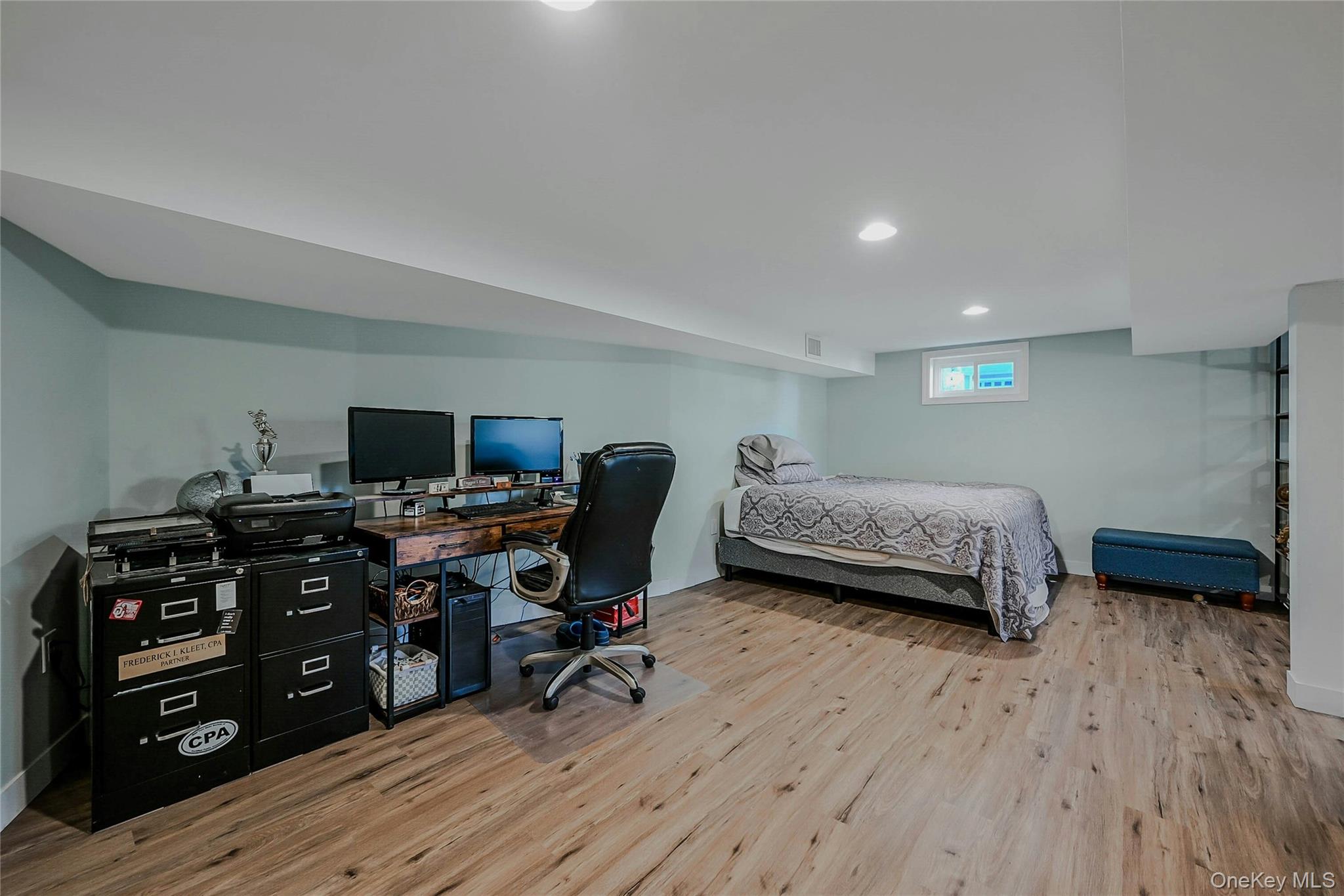 4 Park Road Rocky Point, NY 11778 - Photo 28 of 38 a bedroom with furniture and a wooden floor