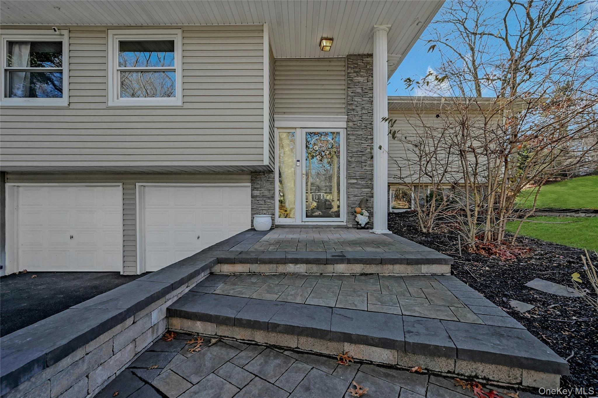 4 Park Road Rocky Point, NY 11778 - Photo 4 of 38 a front view of a house with trees