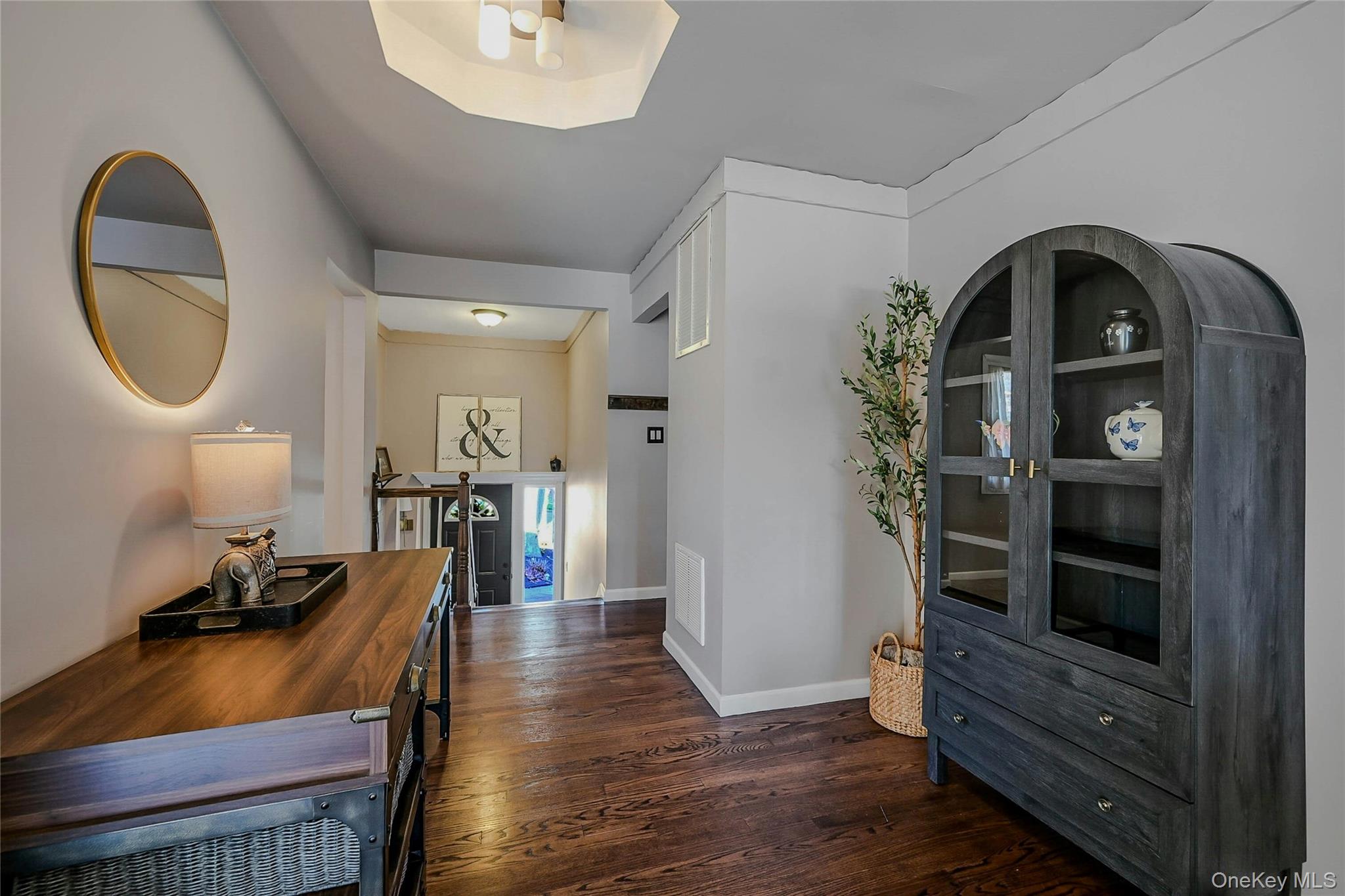 4 Park Road Rocky Point, NY 11778 - Photo 6 of 38 a view of an entryway with wooden floor