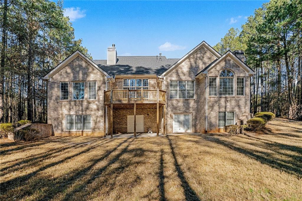 390 Glengarry Chase Covington, GA 30014 - Photo 21 of 21 a front view of a house with a yard