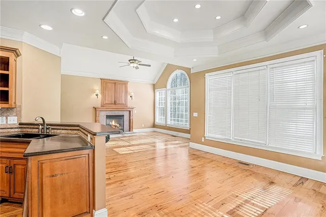 a hallway with a sink and a stove