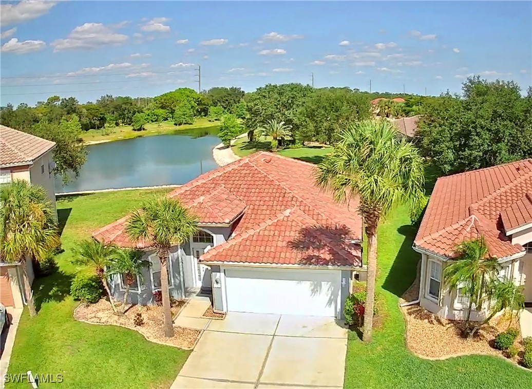 12635 Stone Tower Loop Fort Myers, FL 33913 - Photo 1 of 27 an aerial view of a house with outdoor space lake view and mountain view