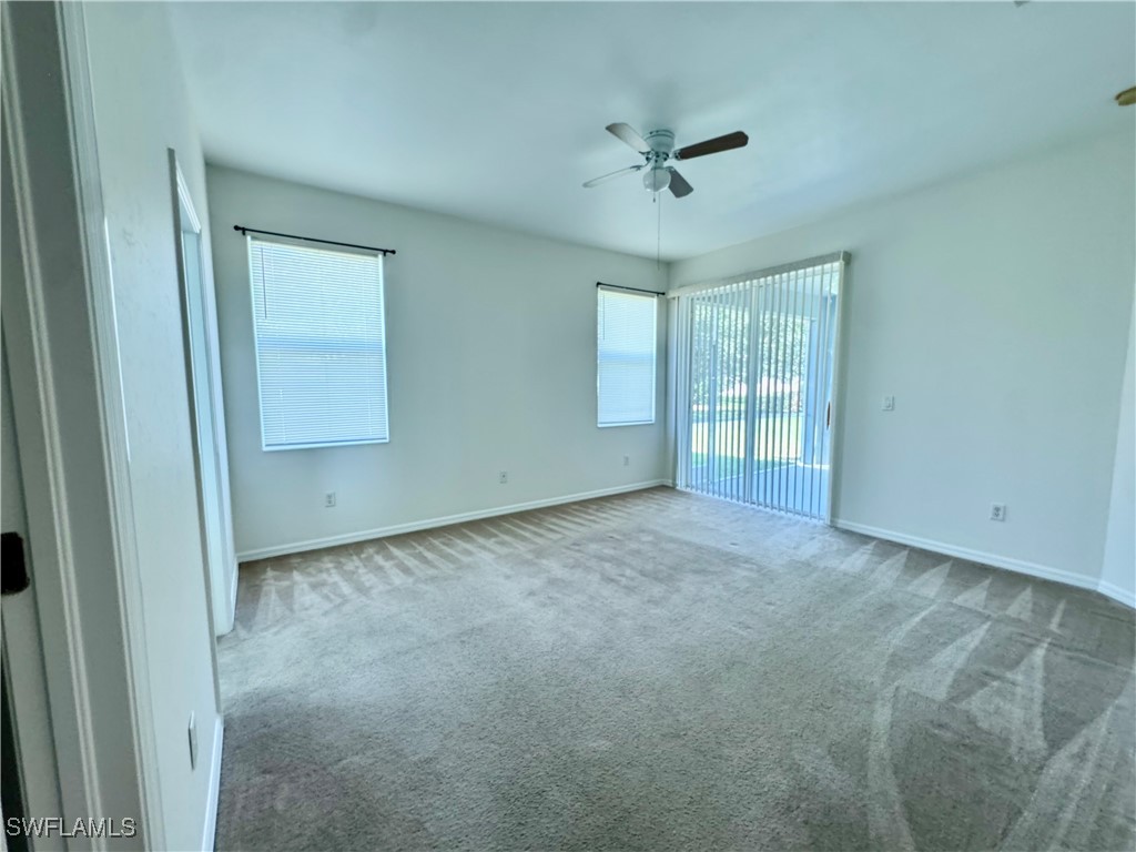 12635 Stone Tower Loop Fort Myers, FL 33913 - Photo 17 of 27 a view of an empty room with a window