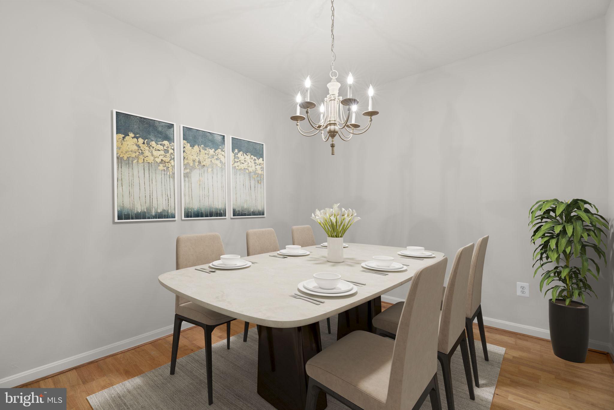 7315 Maplecrest Road, Unit 104 Elkridge, MD 21075 - Photo 14 of 58 a view of a dining room with a table and chairs