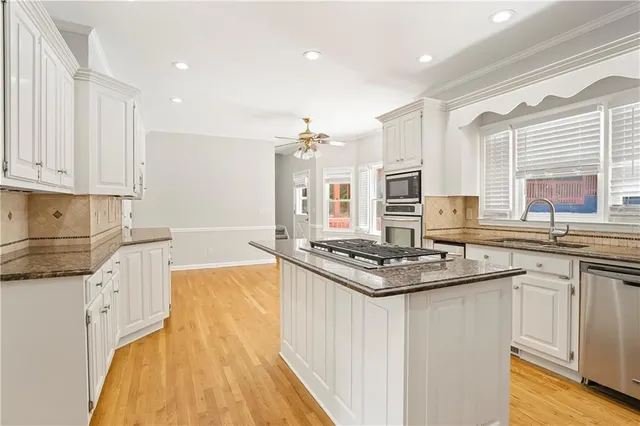 a bathroom with a bathtub and window