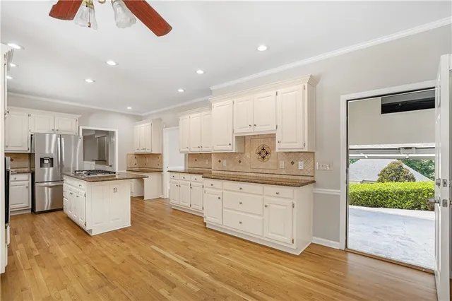 a bathroom with a sink and a window