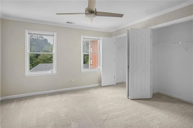 a view of an empty walk in closet