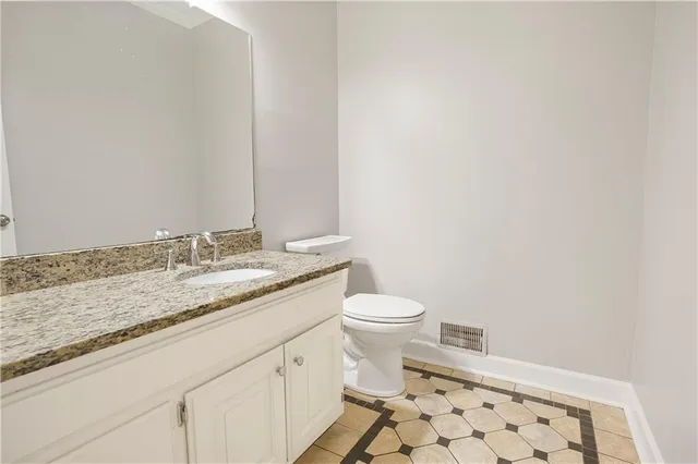 a view of a park with iron fence