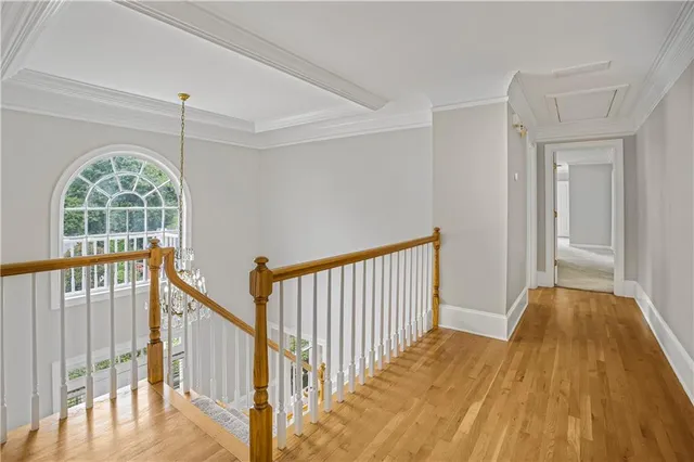 a view of entryway with wooden floor