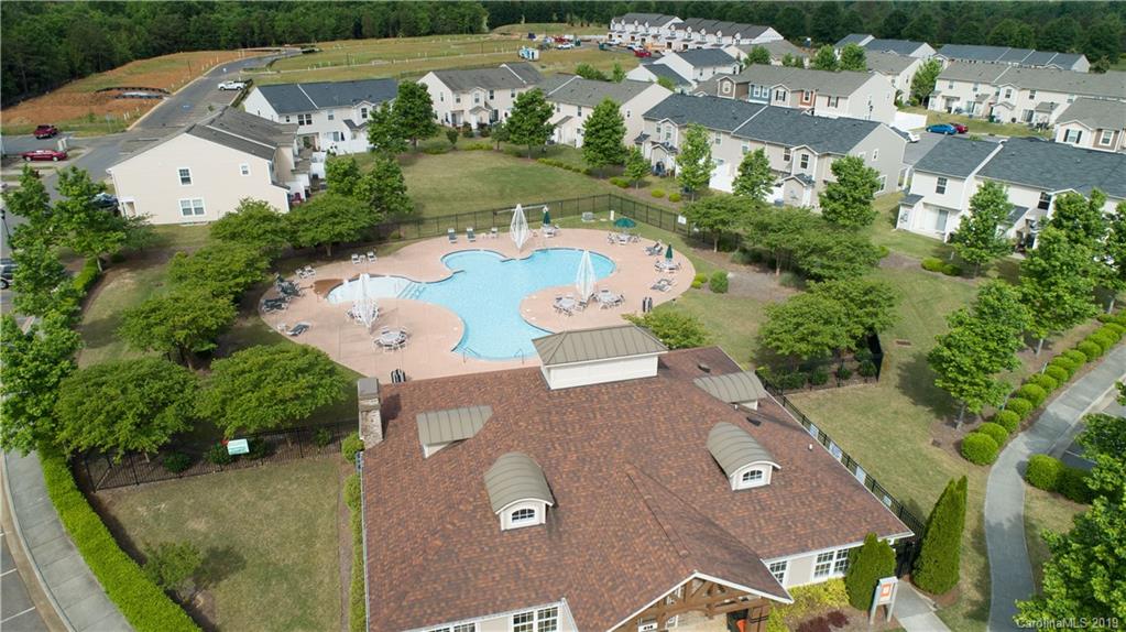 254 River Clay Road, Unit 207 Fort Mill, SC 29708 - Photo 22 of 23 an aerial view of a house with a yard