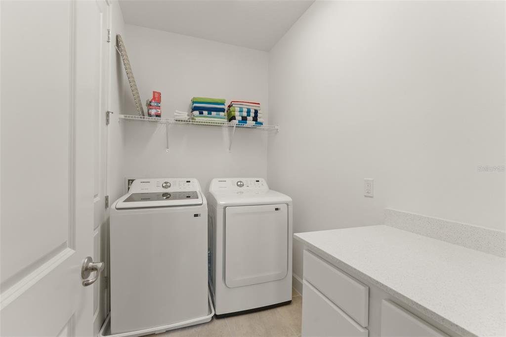 1531 Fairview Circle Reunion, FL 34747 - Photo 22 of 42 a utility room with dryer and washer