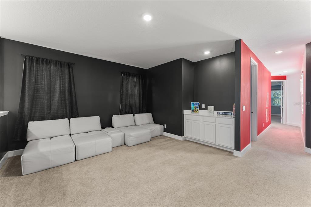 1531 Fairview Circle Reunion, FL 34747 - Photo 24 of 42 a living room with furniture and bathroom