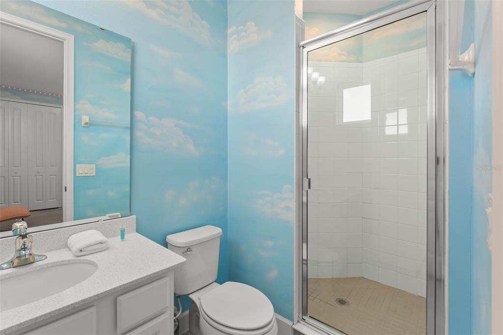 1531 Fairview Circle Reunion, FL 34747 - Photo 31 of 42 a bathroom with a sink a toilet and shower