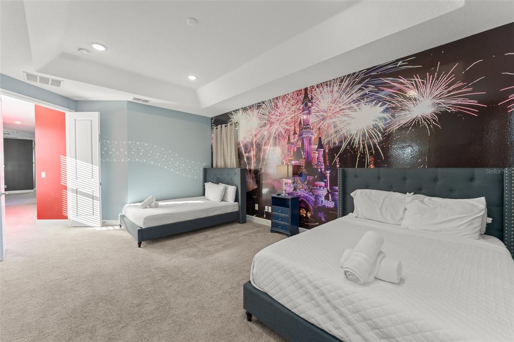 1531 Fairview Circle Reunion, FL 34747 - Photo 33 of 42 a bedroom with a bed and a painting on the wall