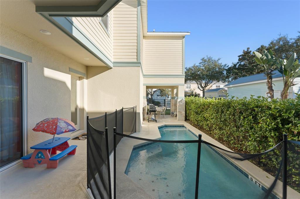 1531 Fairview Circle Reunion, FL 34747 - Photo 38 of 42 a view of outdoor kitchen with seating space