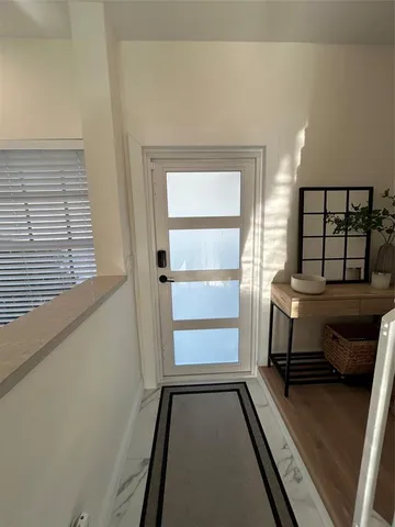 a view of a street with of houses on both side