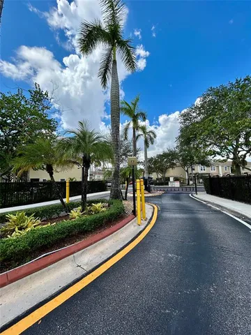 a living room with a flat screen tv and a window