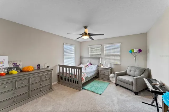 an aerial view of multiple houses with yard