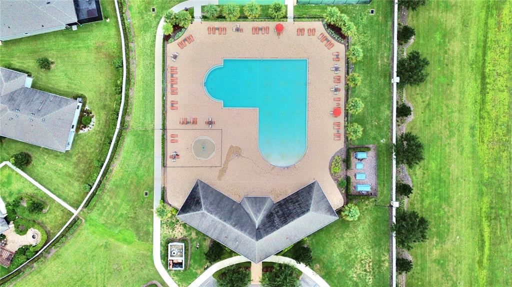 19065 Malinche Loop Spring Hill, FL 34610 - Photo 66 of 72 an aerial view of a house with a garden and trees