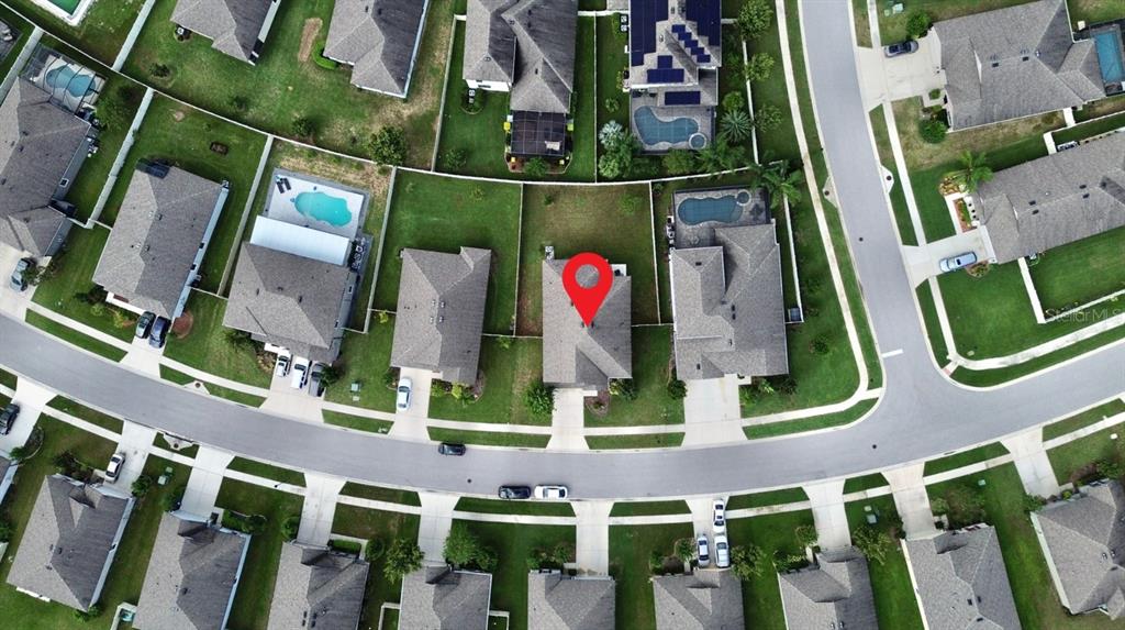 19065 Malinche Loop Spring Hill, FL 34610 - Photo 71 of 72 an aerial view of multi story residential apartment building