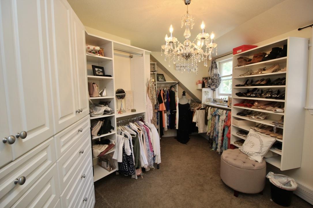10 Lan Road Sandwich, MA 02563 - Photo 25 of 35 a view of walk in closet with clothes and shoes