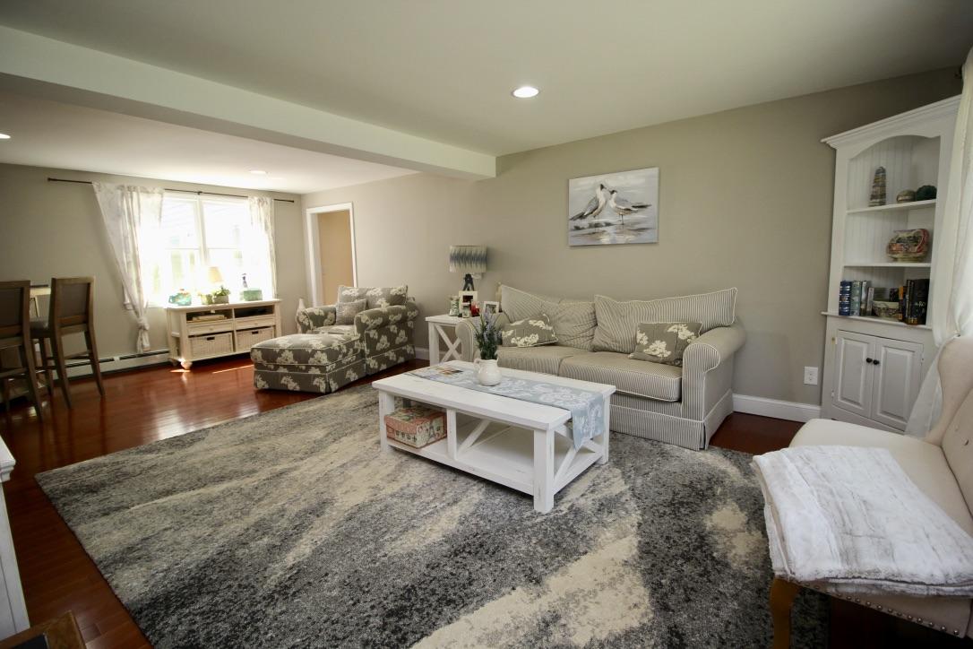 10 Lan Road Sandwich, MA 02563 - Photo 6 of 35 a living room with furniture and a table