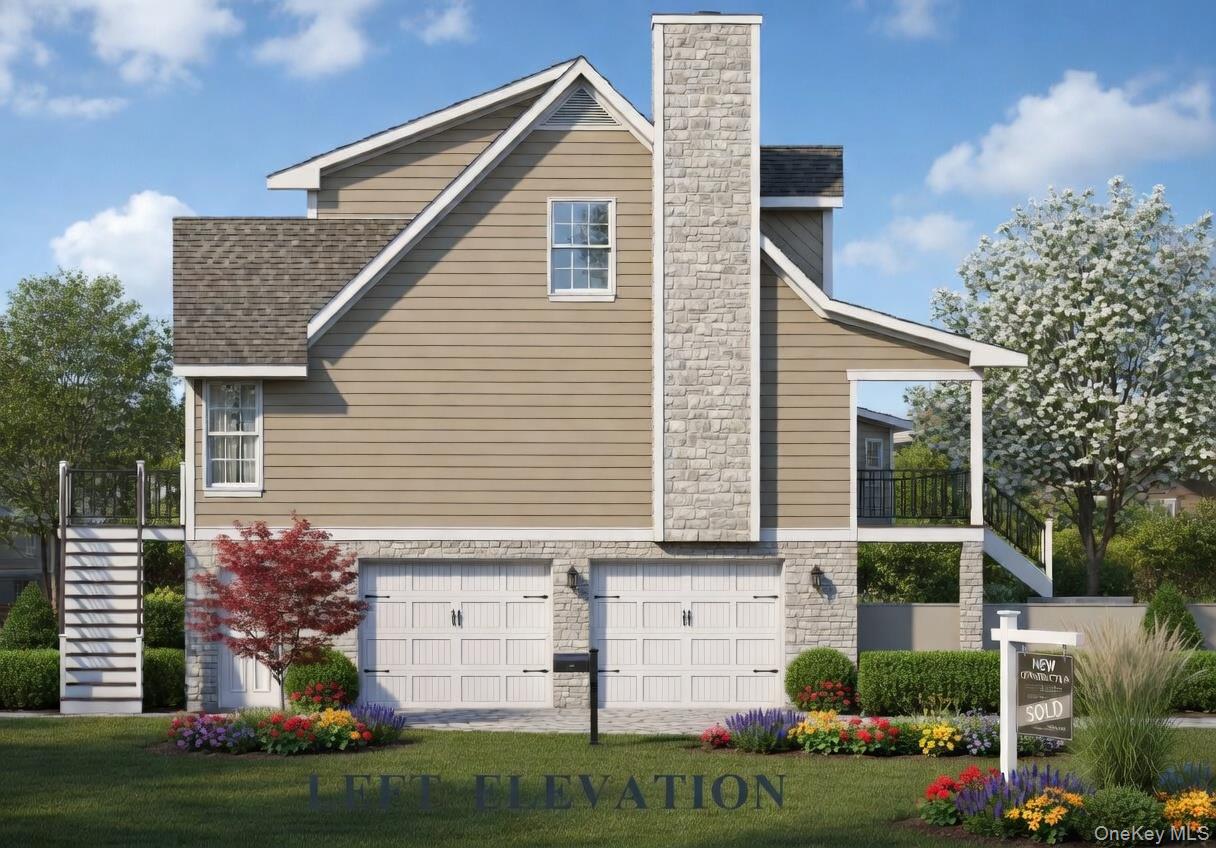 Lot D Merritts Path Rocky Point, NY 11778 - Photo 2 of 9 a view of a white house with large windows and a small yard