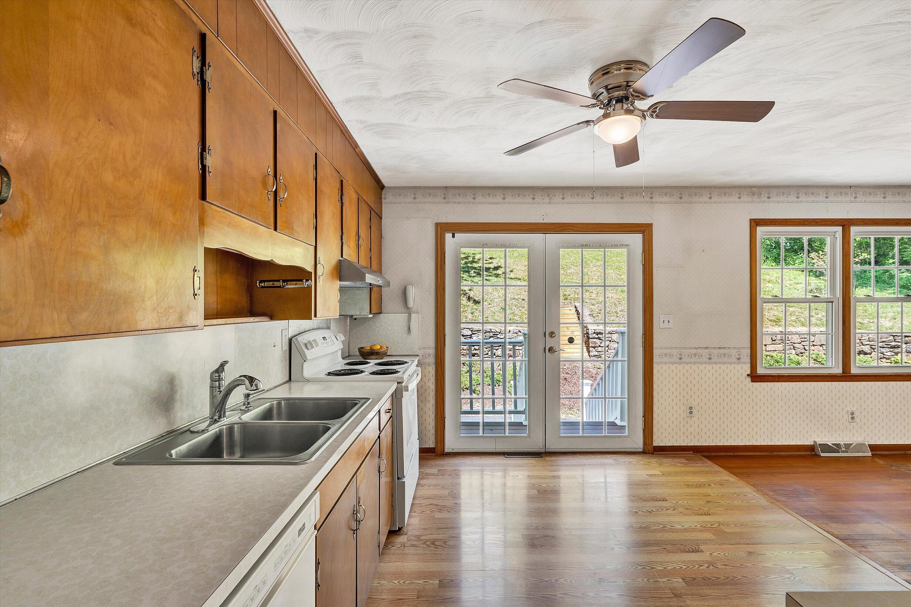 133 Kelsey Way Fincastle, VA 24090 - Photo 20 of 58 a kitchen with a sink and a window