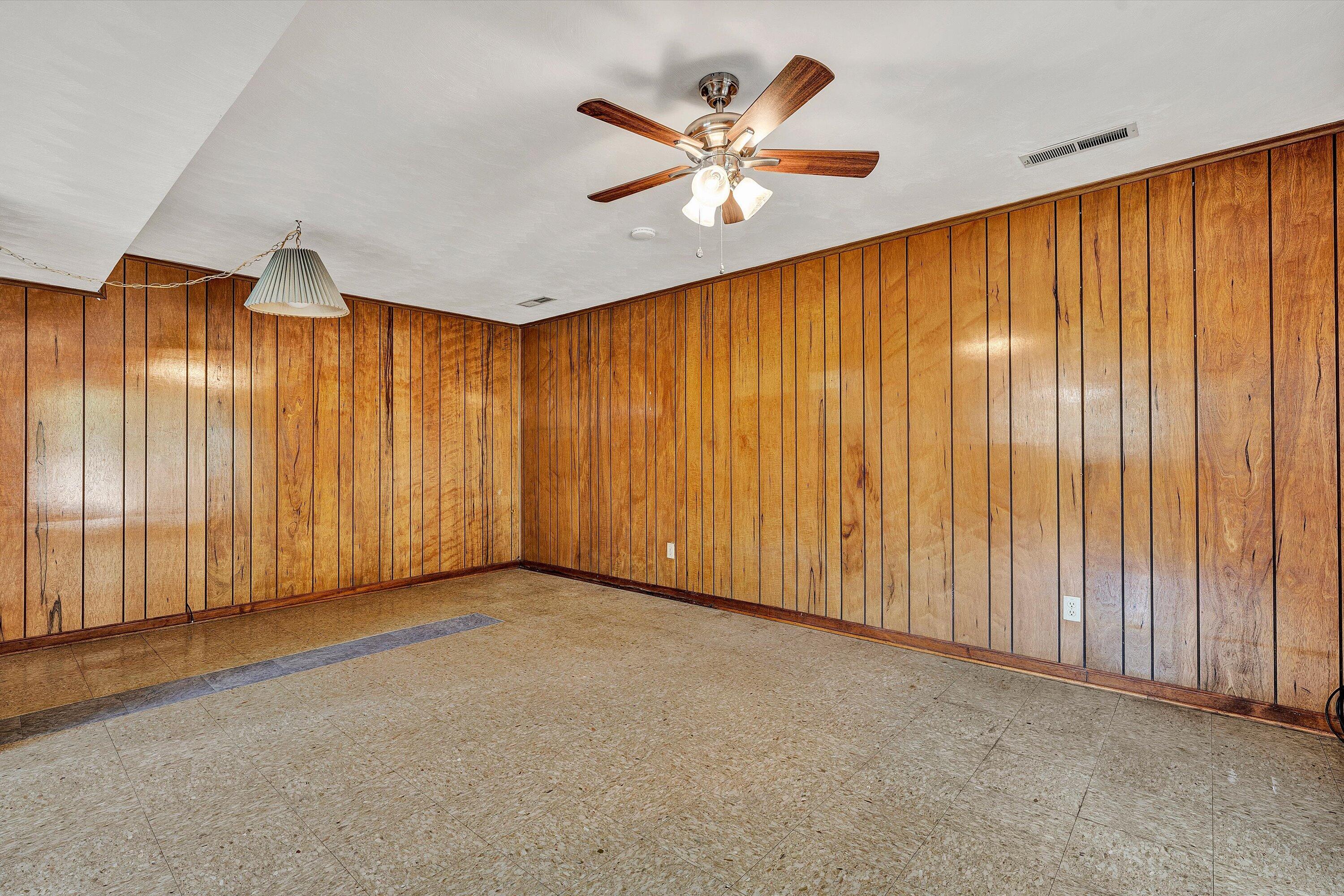 133 Kelsey Way Fincastle, VA 24090 - Photo 29 of 58 an empty room with a ceiling fan and a window