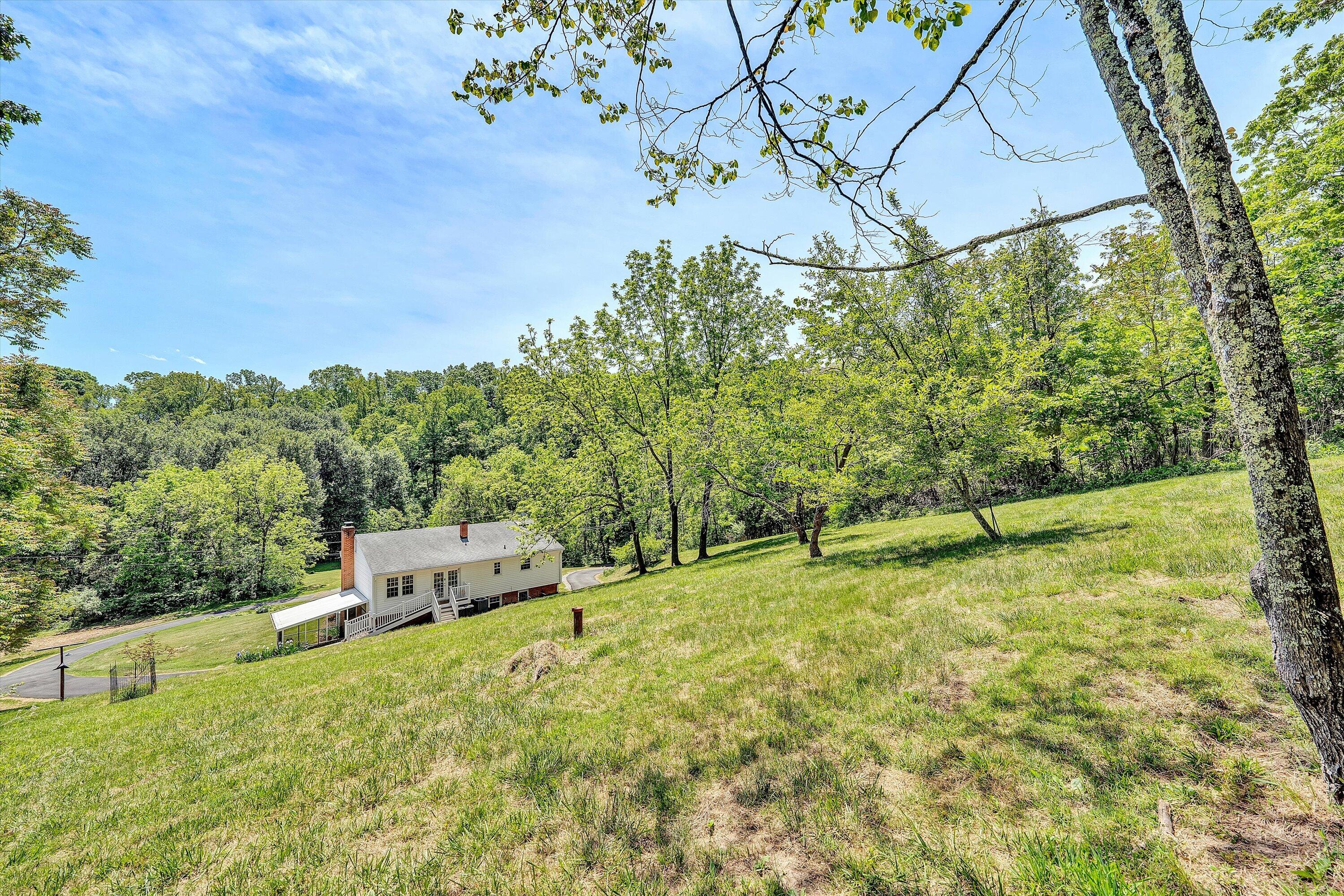 133 Kelsey Way Fincastle, VA 24090 - Photo 42 of 58 a backyard of a house with table and chairs