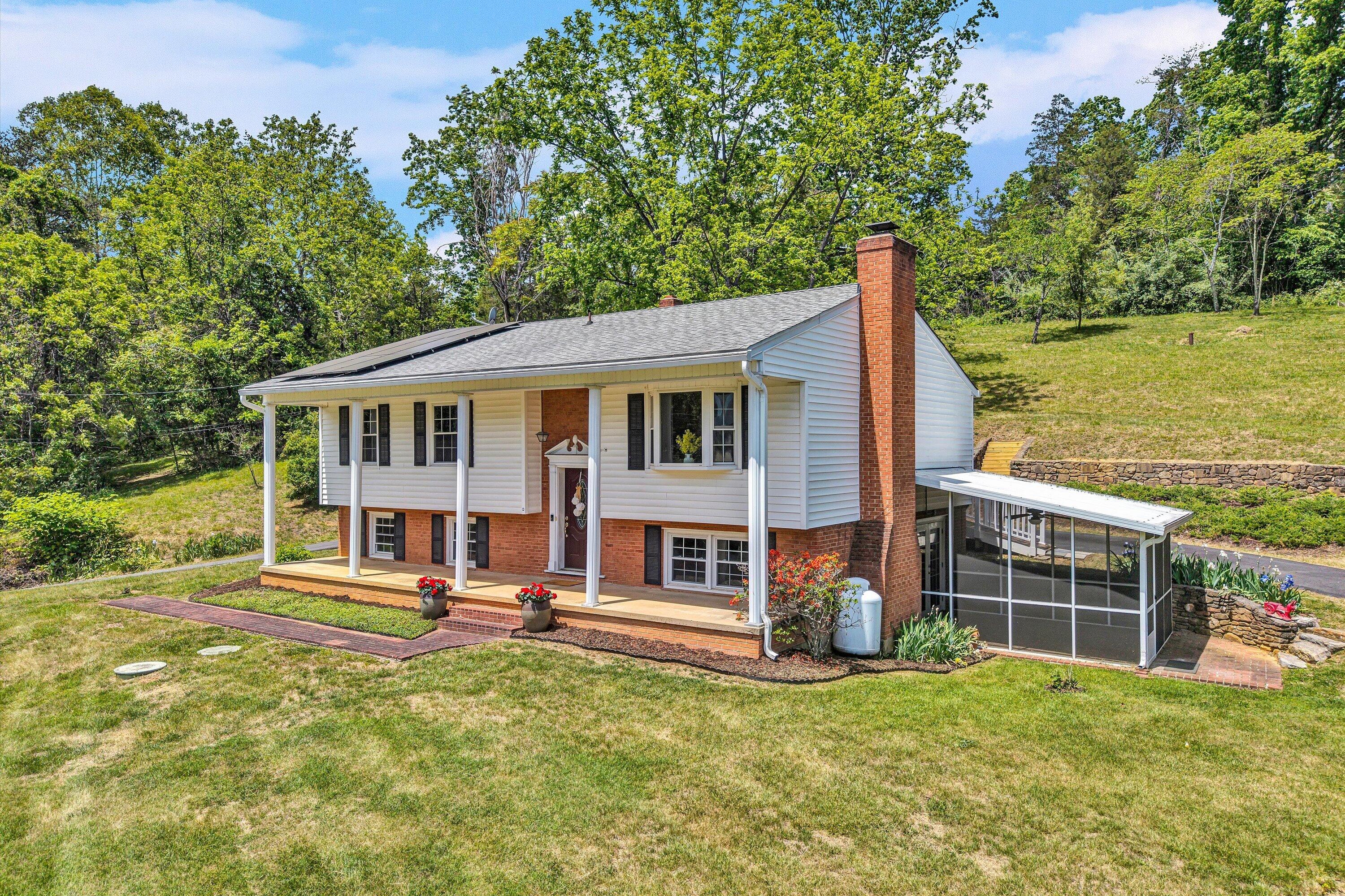 133 Kelsey Way Fincastle, VA 24090 - Photo 52 of 58 a view of a house with backyard porch and sitting area
