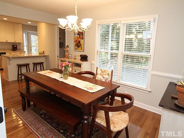 3512 Old Post Road Raleigh, NC 27612 - Photo 8 of 25 a view of a dining room with furniture window and outside view
