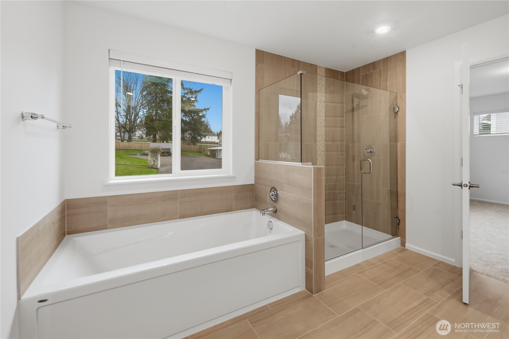 20145 135th Place Southeast Monroe, WA 98272 - Photo 9 of 19 a bathroom with a bathtub and a shower