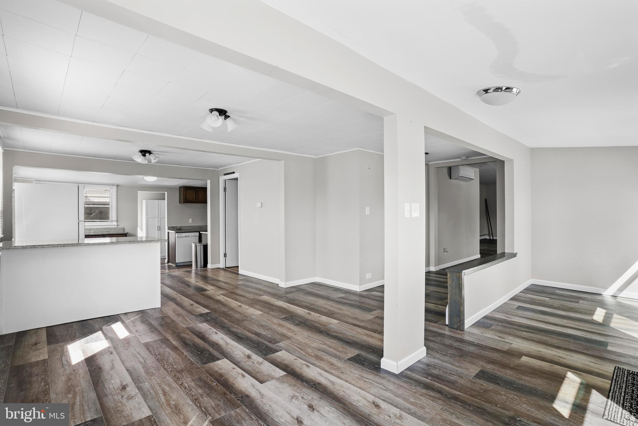 1816 Keymar Road Edgewater, MD 21037 - Photo 14 of 39 a view of a hallway with wooden floor and staircase