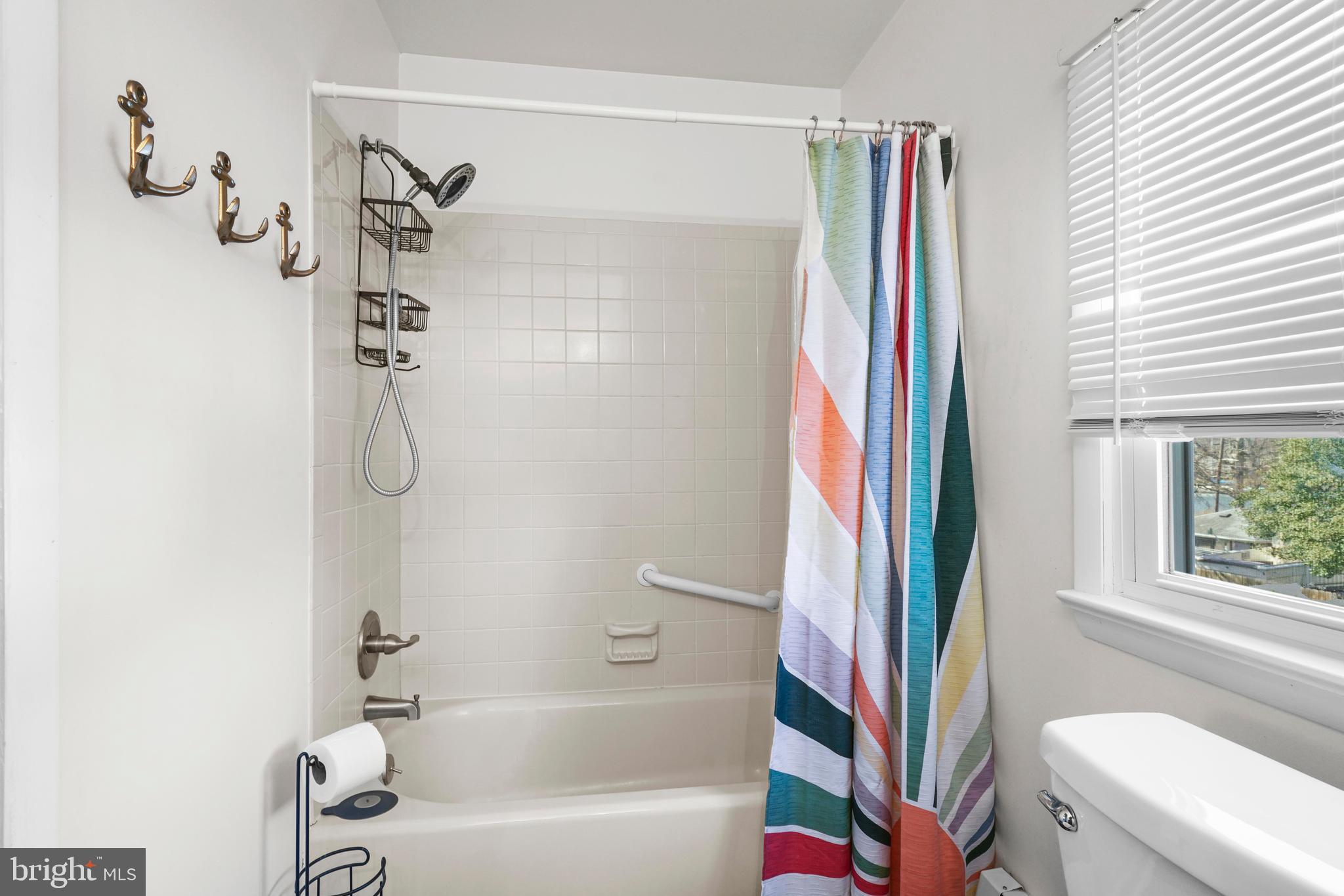 1816 Keymar Road Edgewater, MD 21037 - Photo 24 of 39 a bathroom with a bathtub and a shower