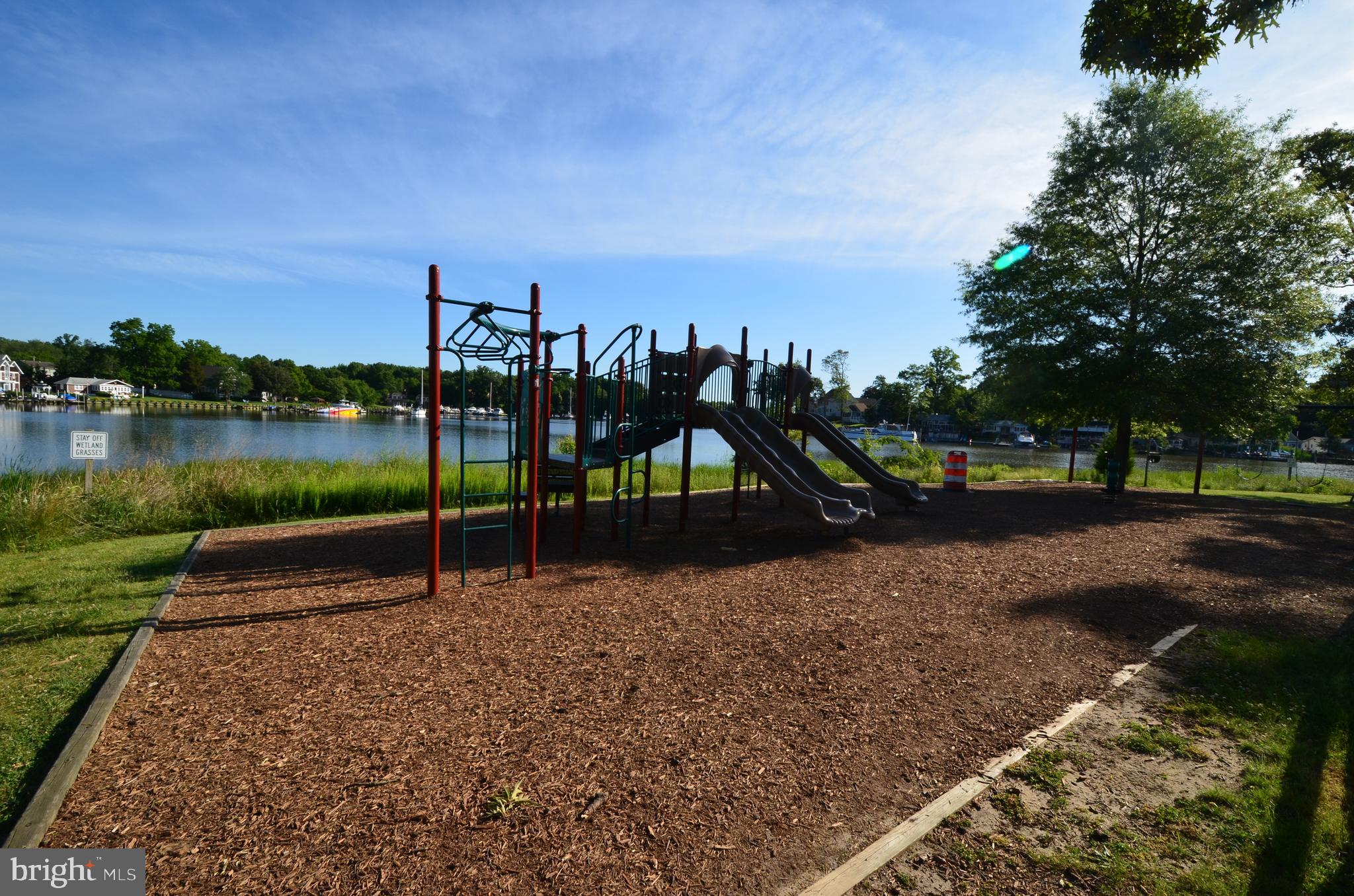 1816 Keymar Road Edgewater, MD 21037 - Photo 33 of 39 a view of a lake with a yard