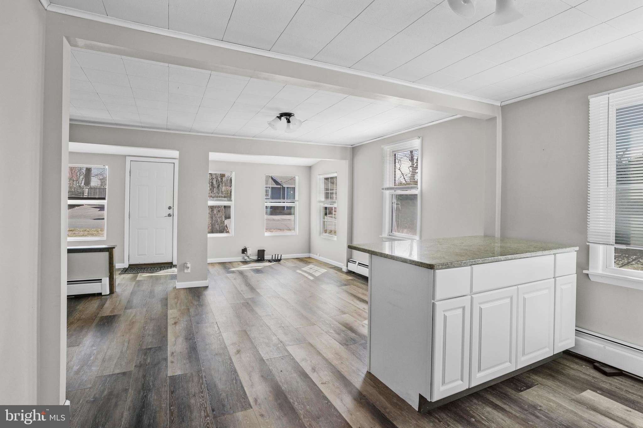 1816 Keymar Road Edgewater, MD 21037 - Photo 7 of 39 a big room with wooden floor and windows