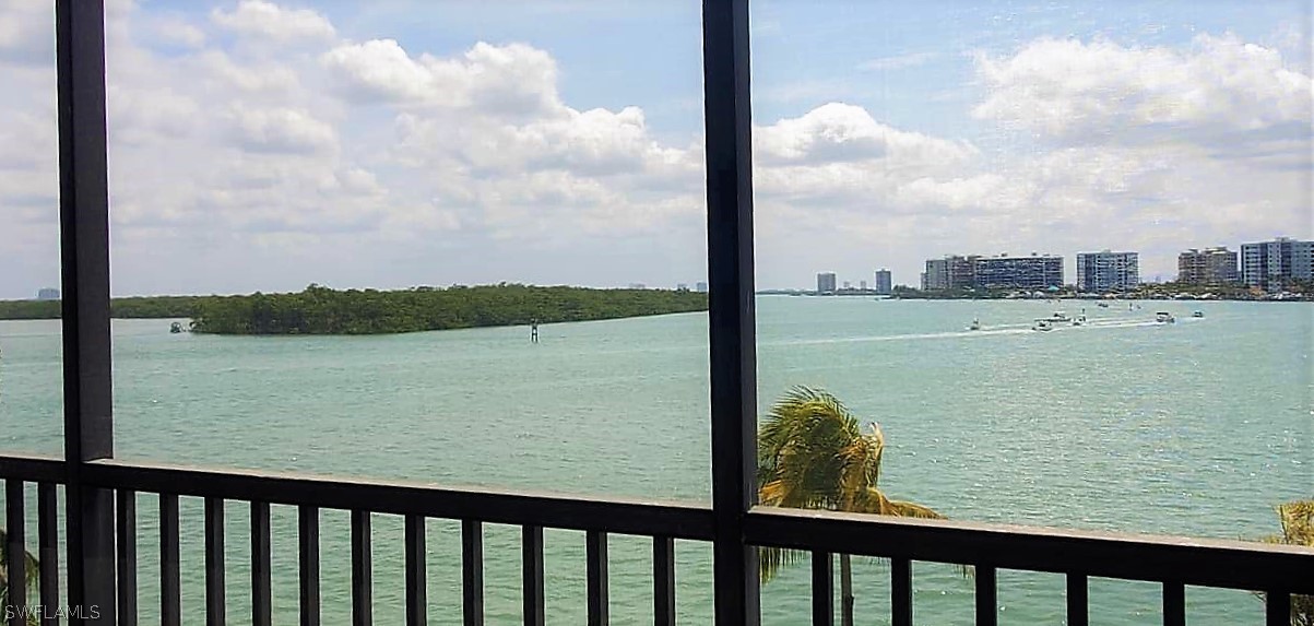 400 Lenell Road, Unit 207 Fort Myers Beach, FL 33931 - Photo 4 of 16 a view of a lake from a balcony