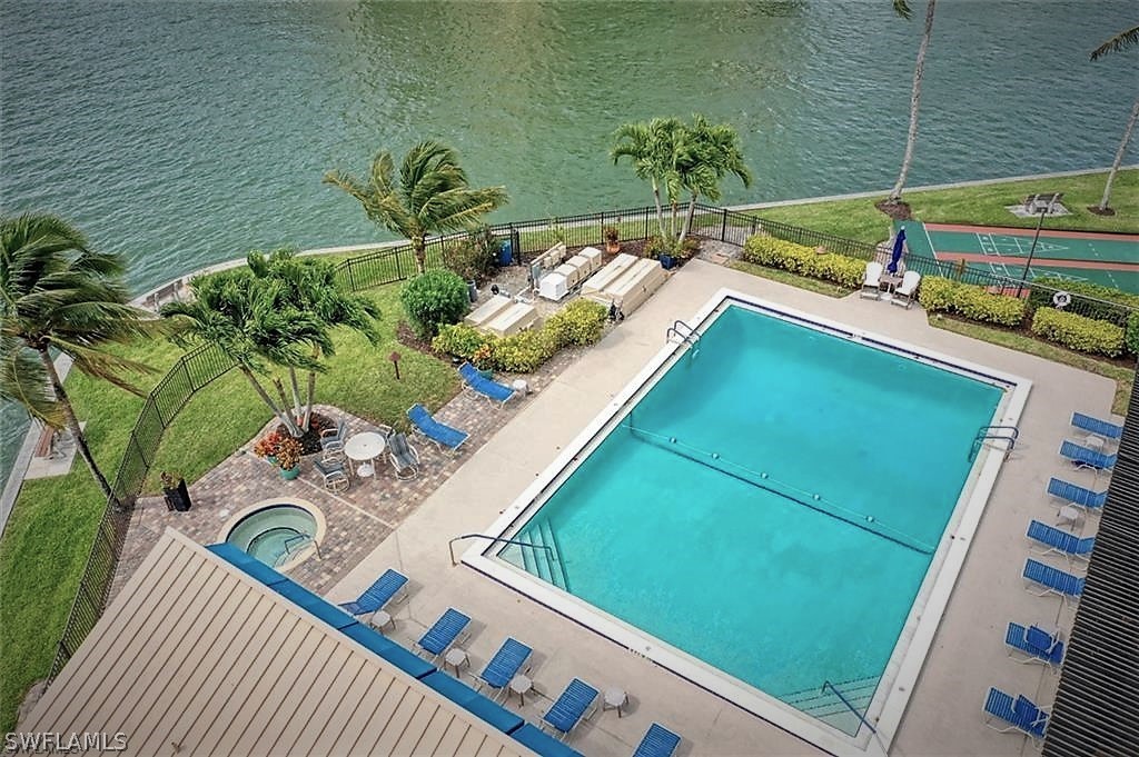 400 Lenell Road, Unit 207 Fort Myers Beach, FL 33931 - Photo 8 of 16 a view of a balcony with chairs